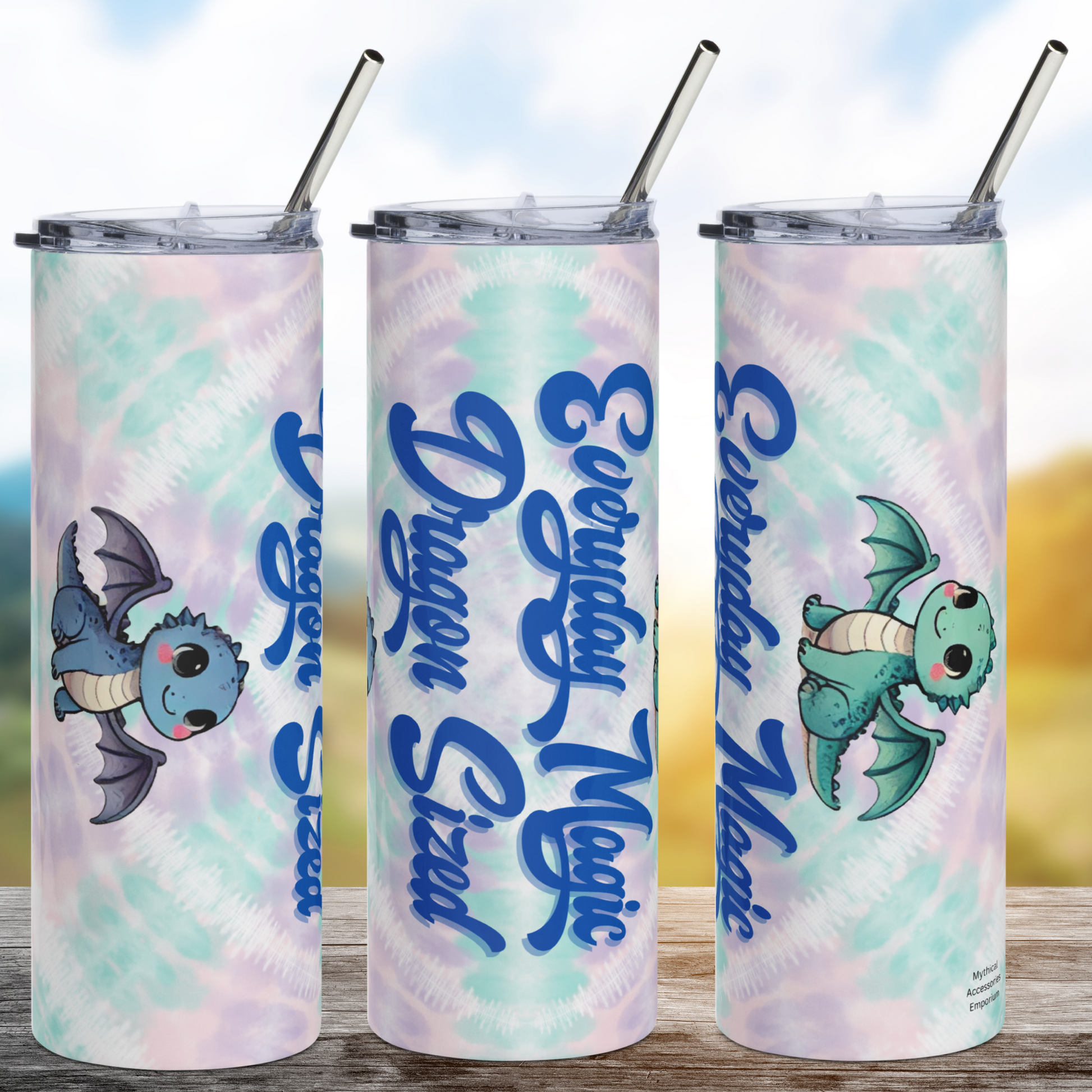 Everyday Magic Dragon Sized 20 oz stainless steel tumbler. This photo shows the right, front, and left side of the skinny tumbler. Background is tie dye green, pink, and purple. Text in cursive script, "Everyday Magic Dragon Sized" is a deep blue with a purple tinge. You see a kawaii dragon in sage and a kawaii blue dragon. Book Club Gift