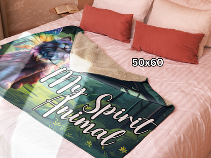 Lightweight Sherpa Throw Blanket spread out on a queen bed for sizing. This is the 50"x60" throw. It almost covers the width of the bed, but not the length. Top is flipped down to show the plush sherpa side. Longhaired Maine Coon Cat in Rainbow Fur with Fairy Wings in Rainbow colors. Fairy Cat is sitting in a moonlit forest with a full moon behind the cat. The background is in greens. The cat is pinks, purple, blue, yellow, and orange pastels. To the right of the cat white text My Spirit Animal