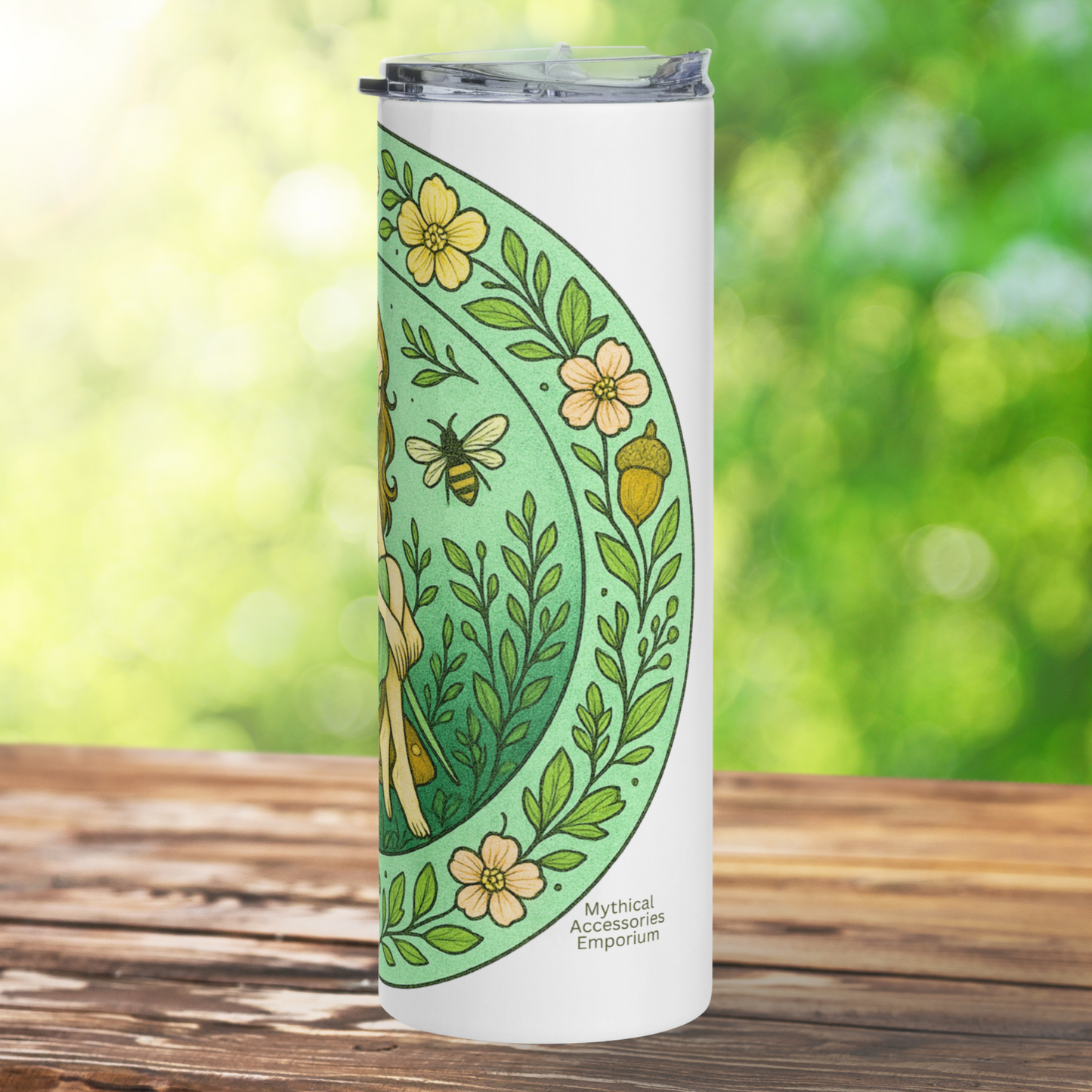 Fairy Circle 20 oz Stainless Steel Travel Tumbler, right side view. You see the right side of the floral border. Parts of the fairy's legs and feet are visible. The bee flying next to the fairy is visible. Vintage Fairy Bookish Merch