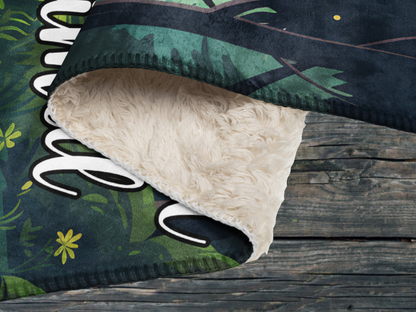 Fairy Cat Throw Blanket folded to show the sherpa plush and the soft front of the blanket. You can see the blanket is stitched completely around the blanket. 