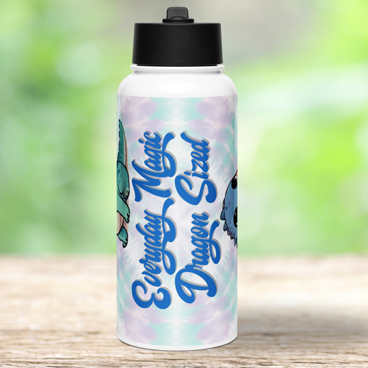 Dragon Everyday Magic Dragon Sized in blue text with a grey shadow on the front of a white stainless steel 32 oz tumbler. Background is purple and blue tie dye. Black lid.