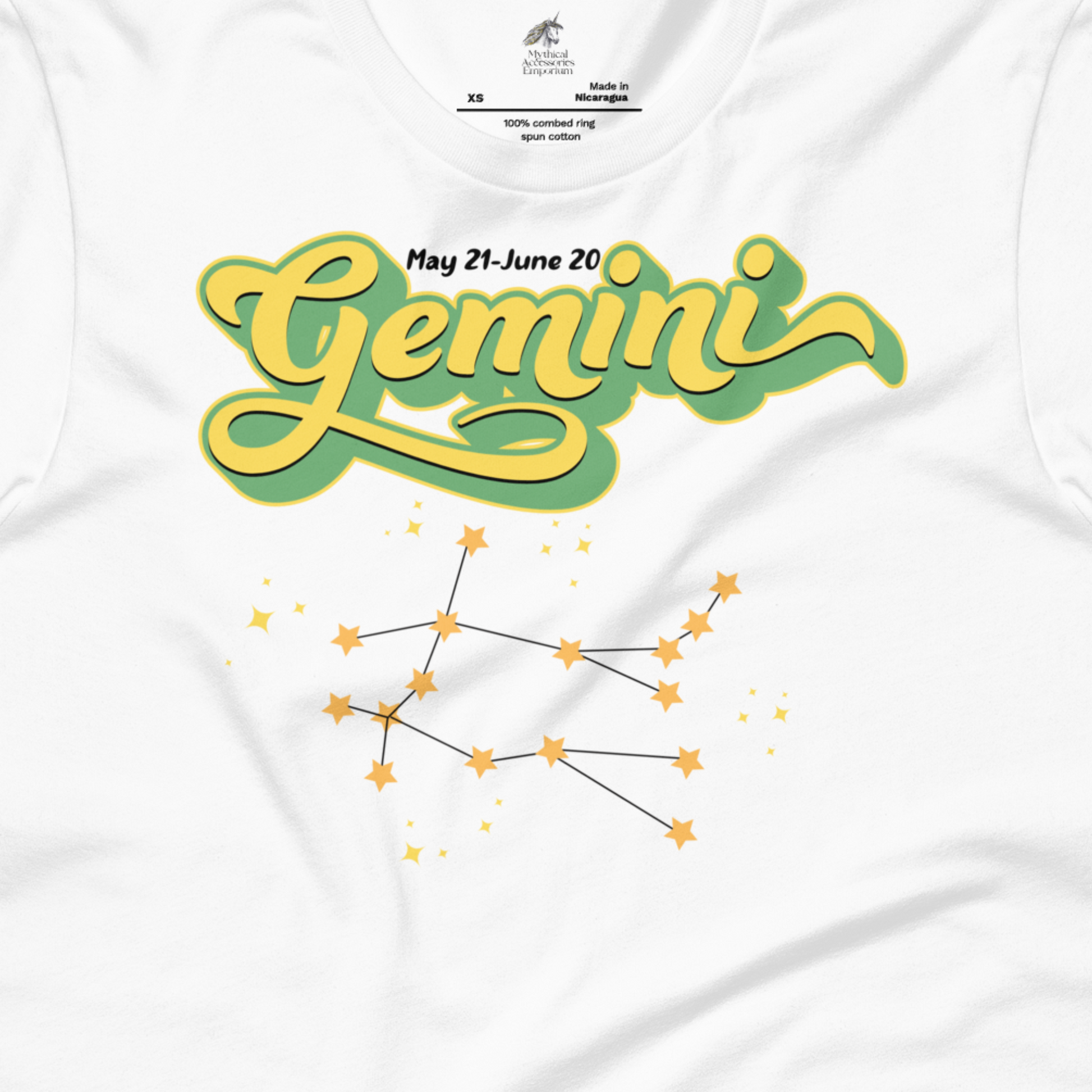 Up close view of men's white unisex Gemini Tee. This Astrology T-Shirt has the word Gemini in large lemon yellow script shadowed in bright green for a 3-D effect. Above this it Says May 21-June 20. Under Gemini is the star constellation with yellow stars connected by a black line and yellow smaller stars surrounding this. The perfect May or June Birthday Gift for him or yourself.