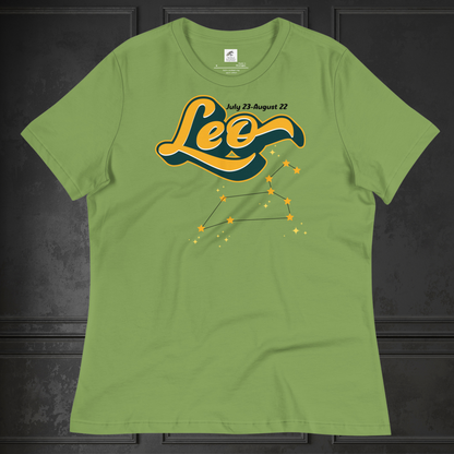 Front view of flat lay leaf green women's Leo Tee. This astrology Leo T-Shirt has the word Leo in large yellow script shadowed in deep green for a 3-D effect. Above this it Says July 23-August 22. Under Cancer is the zodiac star constellation with yellow stars connected by a black line and lighter yellow smaller stars surrounding this. The perfect July or August Birthday Gift for Her or yourself.