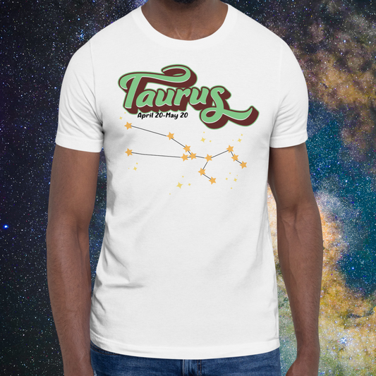 Front view of model wearing  white men's Taurus Tee. This Astrology T-Shirt has the word Taurus in large leaf green script shadowed in deep brown for a 3-D effect. Below this it Says April 20-May 20. At the bottom is the star constellation for Taurus with yellow stars connected by a black line and  smaller stars surrounding the constellation. The perfect April or May Birthday Gift for him or yourself.