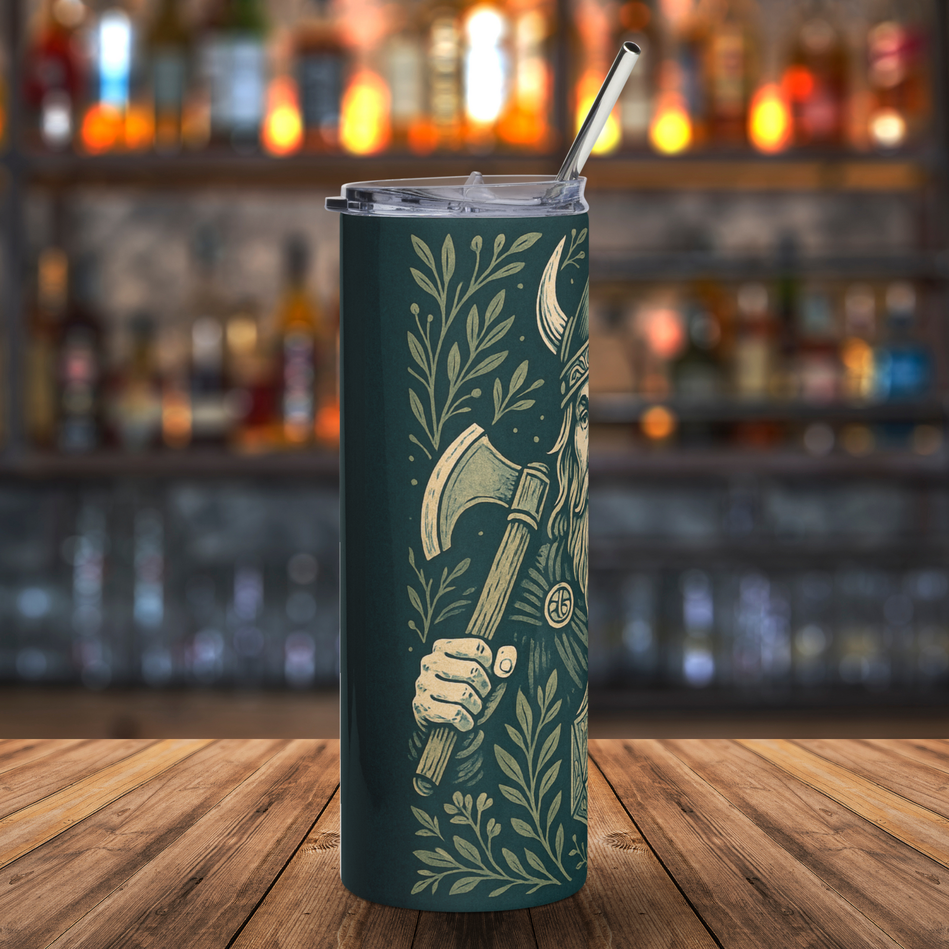 Viking D20 Stainless Steel Tumbler 20 oz left side view. Axe is gripped in a hand and leaning against a shoulder. Surrounded by vines. You can see a horn on the helmet and part of the beard. Warhammer DND Accessories