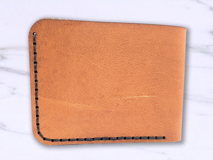 Back View of the Veg Tan Handmade Leather Wallet with dark stitching.