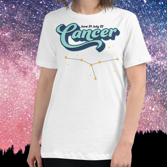 Front view of model wearing white women's Cancer Tee. This astrology Cancer T-Shirt has the word Cancer in large light blue script shadowed in deep blue for a 3-D effect. Above this it Says June 21-July 22. Under Cancer is the zodiac star constellation with yellow stars connected by a black line and lighter yellow smaller stars surrounding this. The perfect June or July Birthday Gift for Her or yourself.
