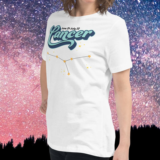 Front left view of model wearing white women's Cancer Tee. This astrology Cancer T-Shirt has the word Cancer in large light blue script shadowed in deep blue for a 3-D effect. Above this it Says June 21-July 22. Under Cancer is the zodiac star constellation with yellow stars connected by a black line and lighter yellow smaller stars surrounding this. The perfect June or July Birthday Gift for Her or yourself.