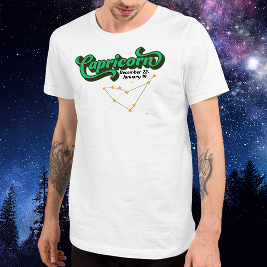 Front view of model wearing white men's Capricorn Tee. This astrology T-Shirt has the word Capricorn in large bright green script shadowed in deep brown almost black for a 3-D effect. Below this it Says December 22-January 19. Under Capricorn is the zodiac star constellation with yellow stars connected by a black line and lighter yellow smaller stars surrounding this. The perfect December or January Birthday Gift for him or yourself.