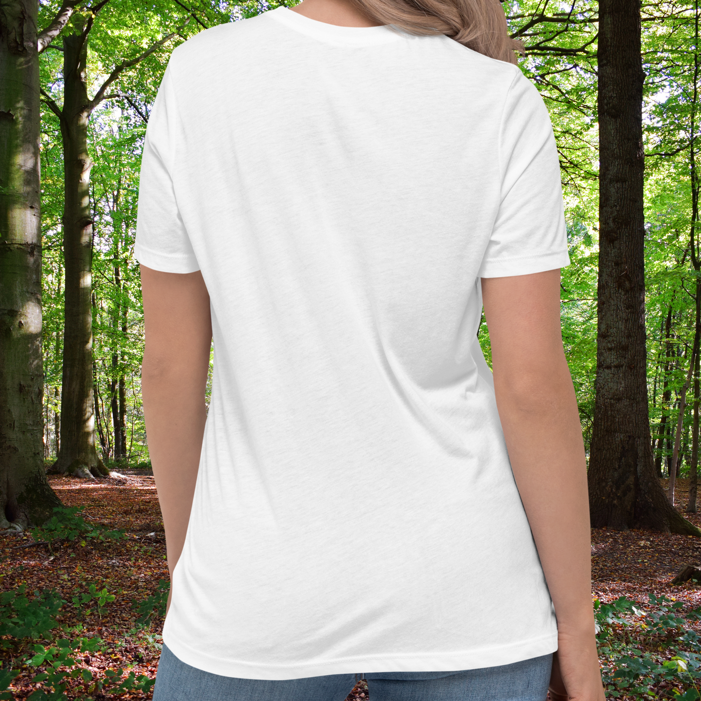 Fenrir women's T-Shirt back view of white shirt on model. here you see that the sleeves come midway down the upper arms. This is a crewneck shirt. The hem lands below the hip on the model. 
