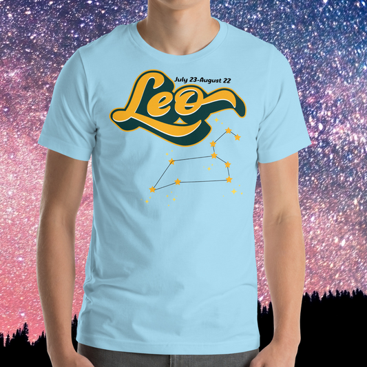 Front view of model wearing  Ocean Blue men's Leo Tee. This astrology Leo T-Shirt has the word Leo in large yellow script shadowed in deep green for a 3-D effect. Above this it Says July 23-August 22. Under Cancer is the zodiac star constellation with yellow stars connected by a black line and lighter yellow smaller stars surrounding this. The perfect July or August Birthday Gift for him or yourself.