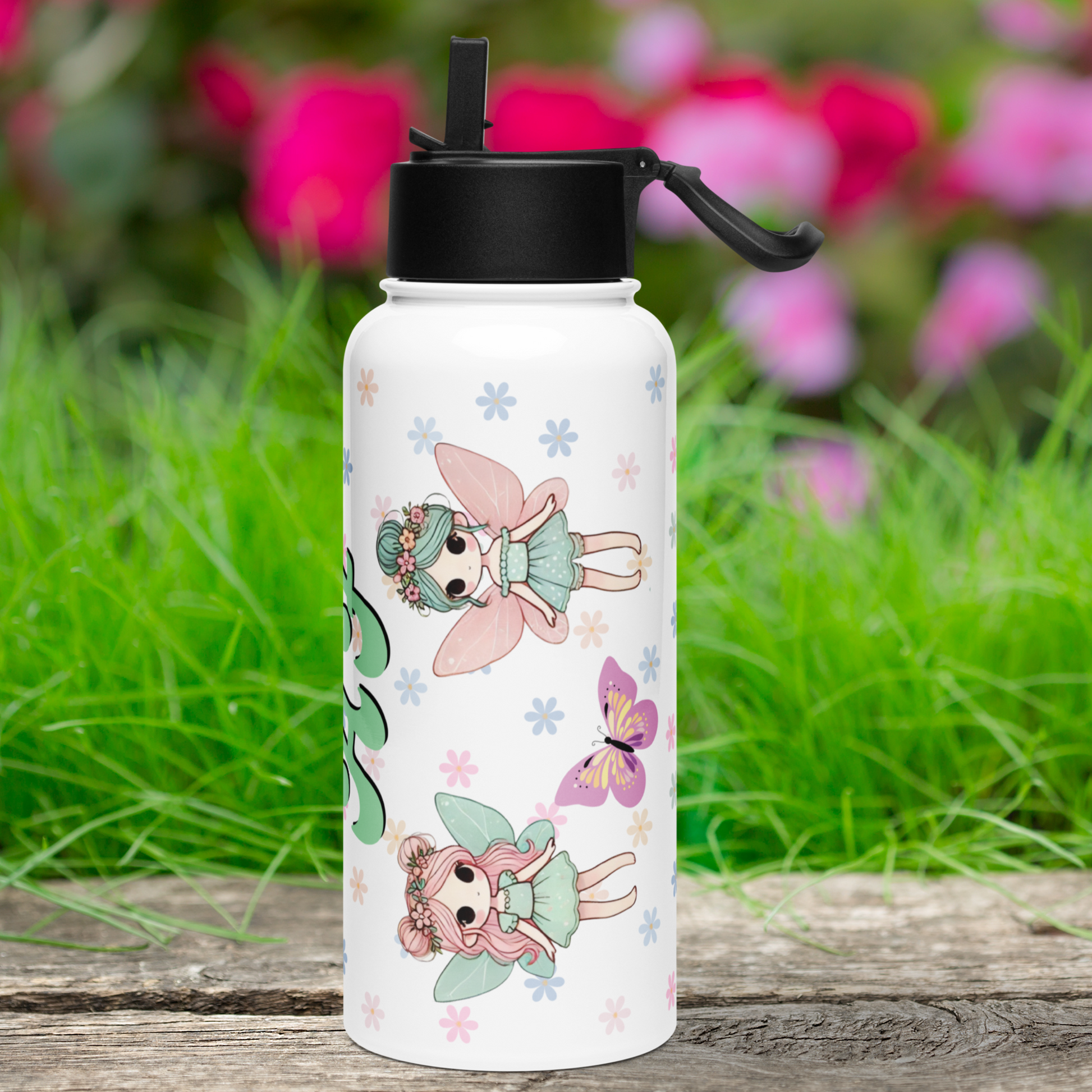 Right side view of fairy white stainless steel tumbler with black lid. The background is pastel mini daisies. At the top is a fairy with blue hair with a bun and pink flowers, A blue dress and pink wings. At the bottom is a pink long haired fairy with buns and flowers. She has blue wings and a blue dress.  A pink butterfly is between the chibi style fairies.
