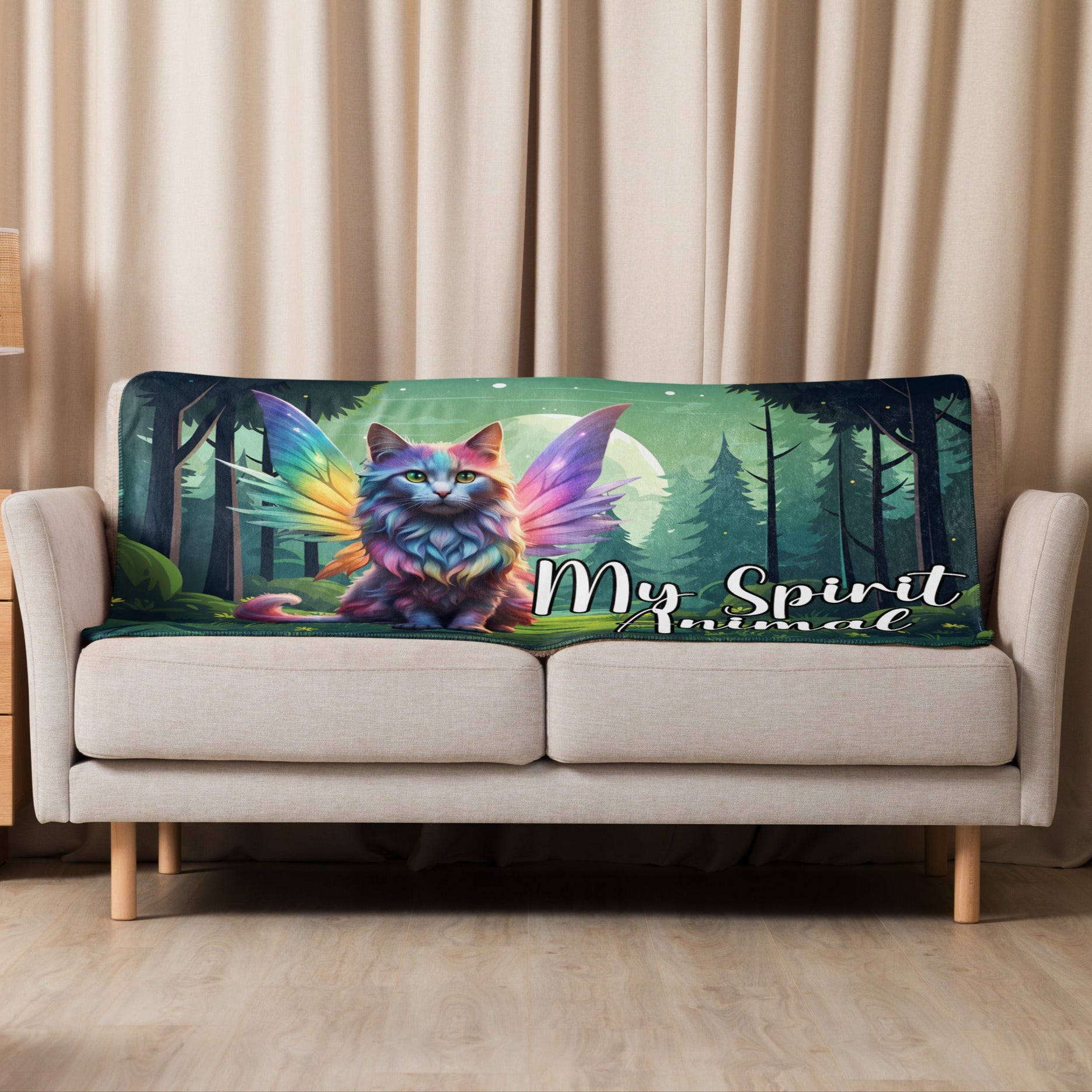 My Spirit Animal Fairy Cat sherpa blanket. Blanket draped over the back of a loveseat size 37x57. Rainbow Fae Persian Cat wings spread behind her, tail curling to the right. Framed  in golden magic symbols. My Spirit Animal under the fairy cat in blue outlined in dark grey.