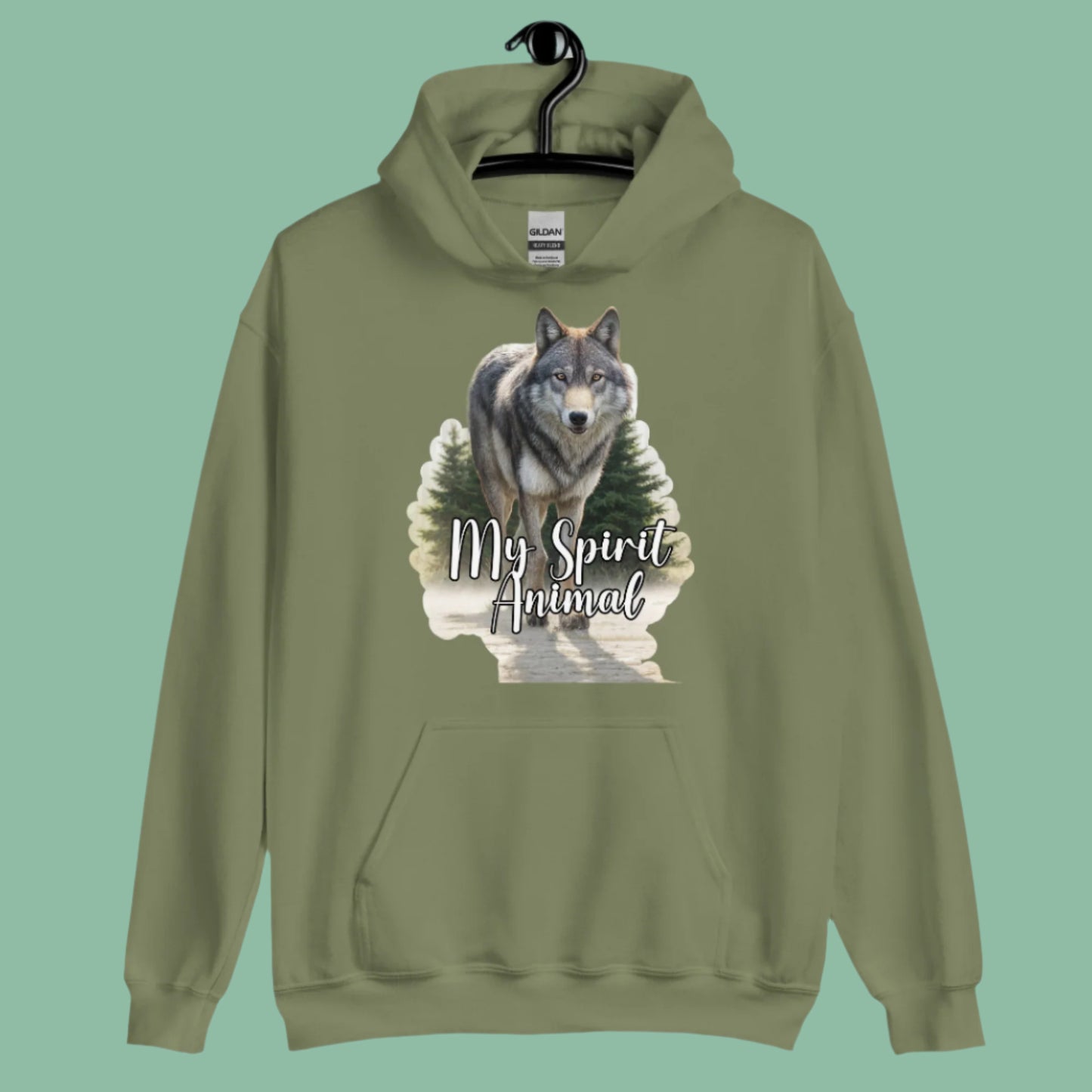 Wolf Women's Hoodie My Spirit Animal. Front view on hanger military green Graphic Hoodie. A grey timberwolf gazes at you from the forest. Timber Wolf Shamanic Totem Animal, Mythical Accessories Emporium.