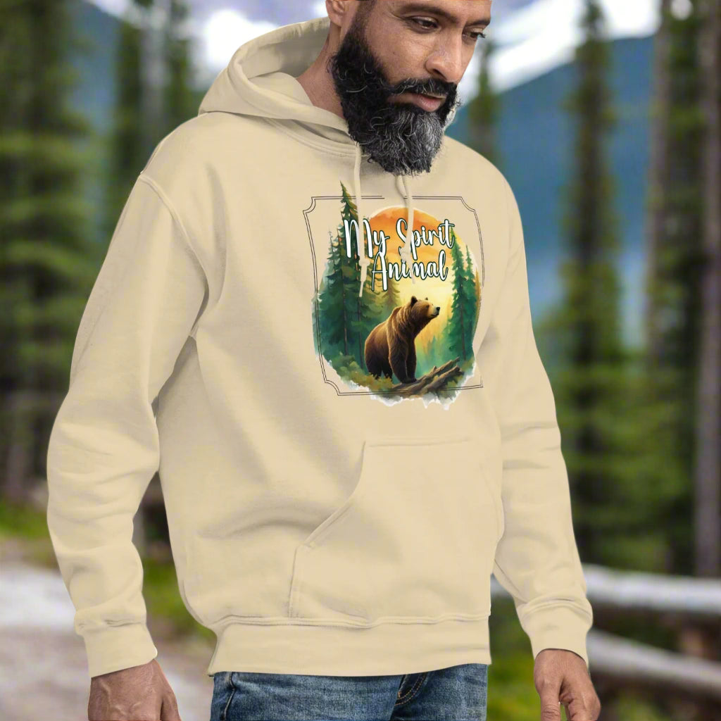 My Spirit Animal bear men's graphic hoodie. Front view sand hoodie.  Grizzly Bear paused in front of logs walking through the forest framed in a sunset. My Spirit Animal text at the top in white script. Mythical Accessories