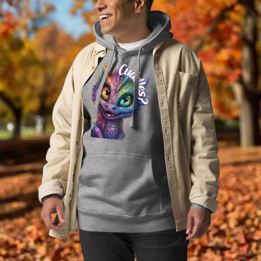 Carbon Grey Men's Hoodie Front View. Purple cross eyed baby dragon. Text above dragon circling head "Cuddles?". 