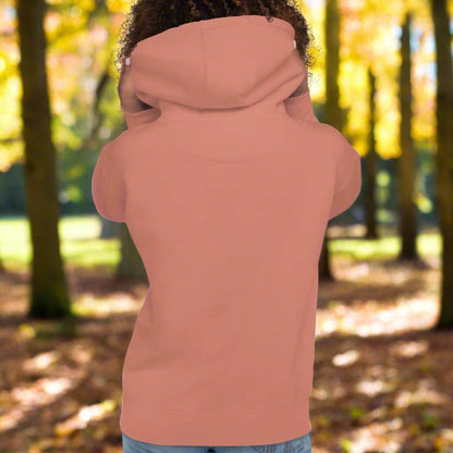 Dusty Rose Women's Hoodie Back View. Purple cross eyed baby dragon. Text above dragon circling head "Cuddles?". 