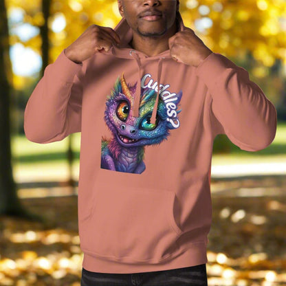 Dusty Rose Men's Unisex Hoodie Front View. Purple cross eyed baby dragon. Text above dragon circling head "Cuddles?". 