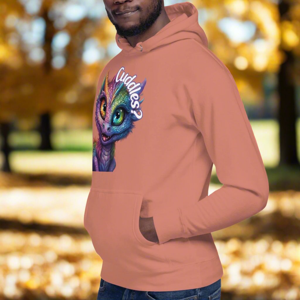 dusty rose Men's Hoodie left side View. Purple cross eyed baby dragon. Text above dragon circling head "Cuddles?". 