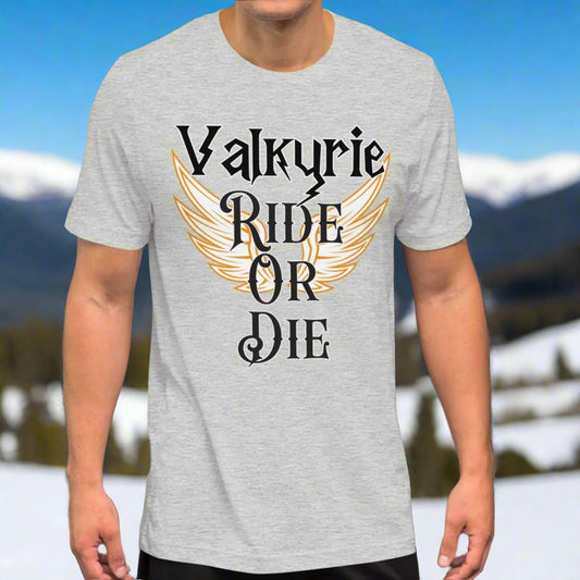 athletic heather grey Front View Valkyrie Ride or Die, Men's Tshirt. White wings edged in gold spread to either side of the shirt. Through the middle is the black text edged in white. Text reads Valkyrie Ride or Die