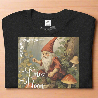 Flat fold black heather tshirt Vintage Once Upon A Time Gnome Fairy Tale Shirt. Vintage Gnome sitting in the forest amidst mushrooms.