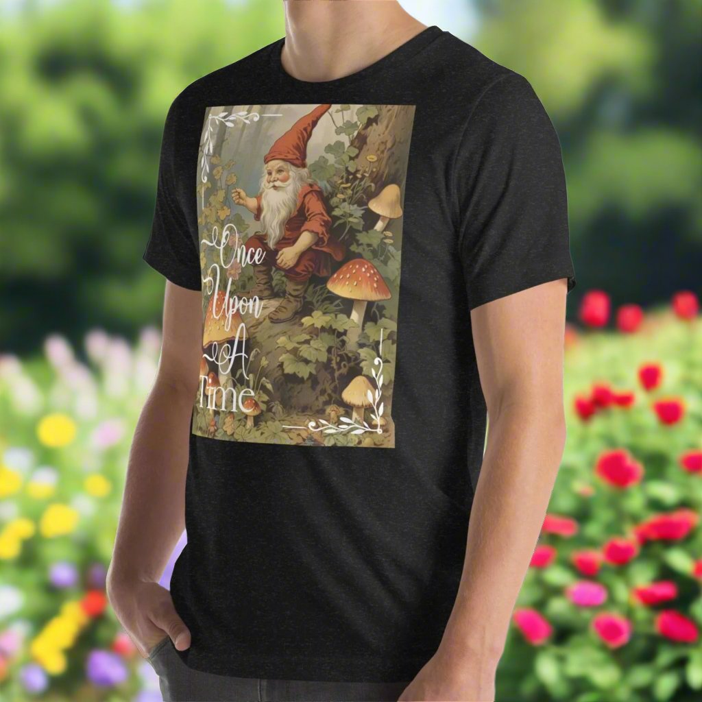 Once Upon A Time Mens heather Black T-shirt front twisted to side view. Vintage Gnome Fairy Tale Shirt. Gnome Sitting in Forest holding a pipe surrounded by mushrooms. Once Upon A Time Text