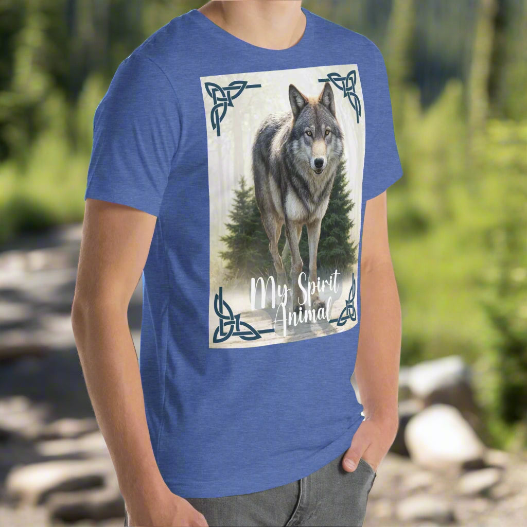 Wolf My Spirit Animal men's T-Shirt. Front right view in heather true royal. A grey wolf gazes at you from the forest bordered in Celtic knots. Timber Wolf Graphic Tee Shamanic Totem Animal, Mythical Accessories Emporium.