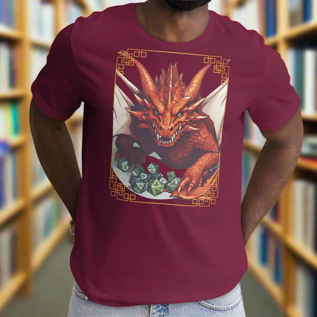 Front View Maroon Red Dragon DND Men's T-Shirt. Mens DND TShirt Dragon D20 Dice Graphic Tee.  Red Dragon bordered in red gold stalking towards over a pile of D20 dice.