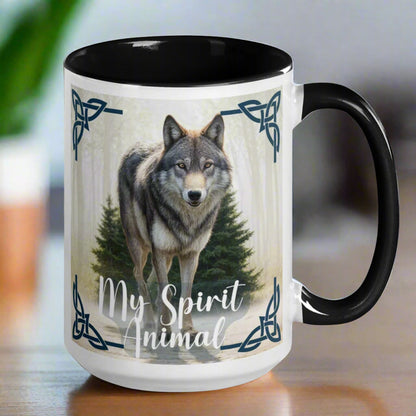 Wolf My Spirit Animal Ceramic Coffee Mug. Handle to the right with a black interior and handle. A grey wolf gazes at you from the forest bordered in Celtic knots. Timber Wolf Shamanic Totem Animal, Mythical Accessories Emporium.