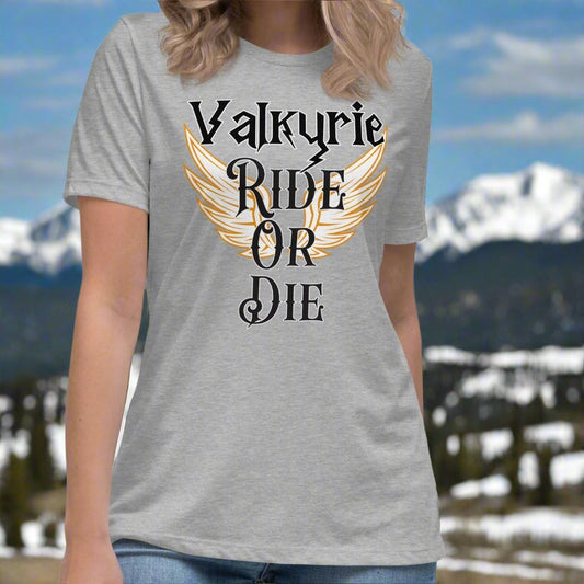 Women's Athletic Heather Front View T-Shirt. White Valkyrie wings edged in gold spread to both sides. Text on shirt Valkyrie Ride or Die.