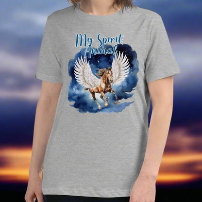 My Spirit Animal Women's Graphic Tee, front view athletic heather, Pegasus white feathered wings on a Pinto with a dark brown mane and tail, galloping through the sky against a background of clouds and stars. Mythical Accessories