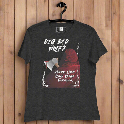 Dark Heather Grey Women's Graphic T-Shirt hanging on a black hanger. Big Bad Wolf Little Red Riding Hood. Big Bad Wolf? More Like Big Bad Drama. Back of Red Riding Hood with hood pulled up, bloodied axe over shoulder.