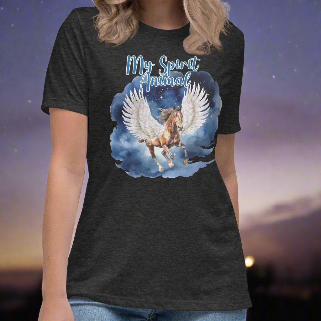 My Spirit Animal Women's Graphic Tee, front view dark grey heather, Pegasus white feathered wings on a Pinto with a dark brown mane and tail, galloping through the sky against a background of clouds and stars. Mythical Accessories