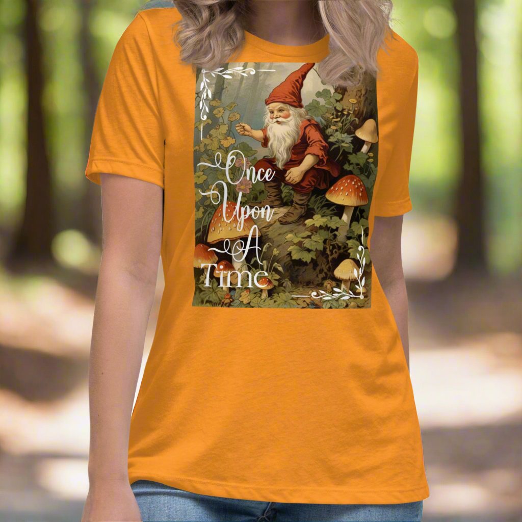 Front view of model wearing (orange) heather marmalade graphic tshirt. Once Upon A Time Fairycore vintage Gnome graphic women's tshirt