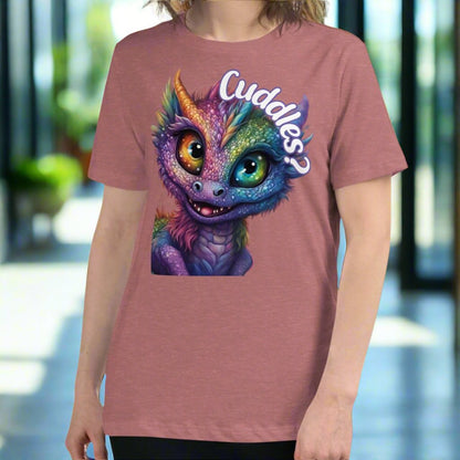 Heather Mauve Dragon Cuddles Front View Women's T-Shirt. Whimsical purple iridescent  dragon looking up at the word Cuddles? above his head