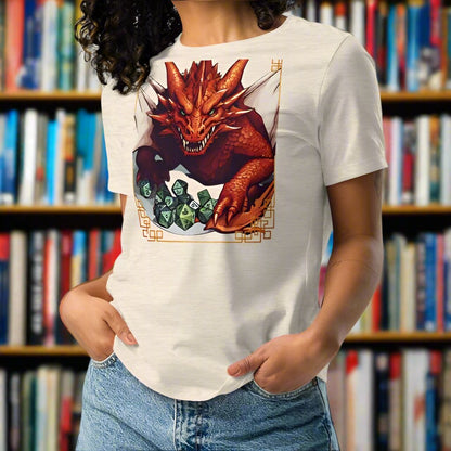 Heather Prism Natural Front View Women's  T-Shirt. DND players gift for adventurers. Red Dragon, wings spread, stalking over a pile of D20 and other dice. RPG and Dungeons Masters