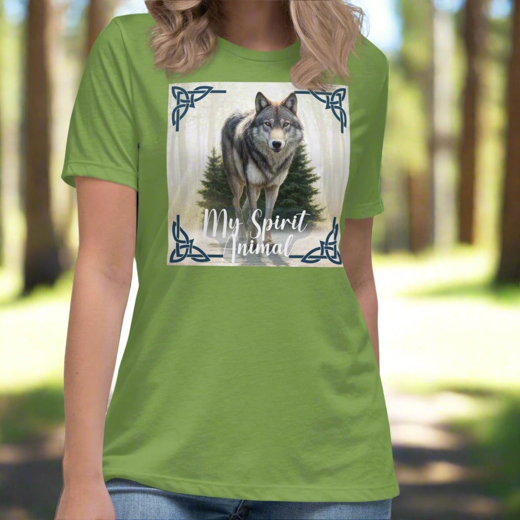 Wolf My Spirit Animal Women's T-Shirt. Front view in Leaf (green). A grey wolf gazes at you from the forest bordered in Celtic knots. Timber Wolf Graphic Tee Shamanic Totem Animal, Mythical Accessories Emporium.