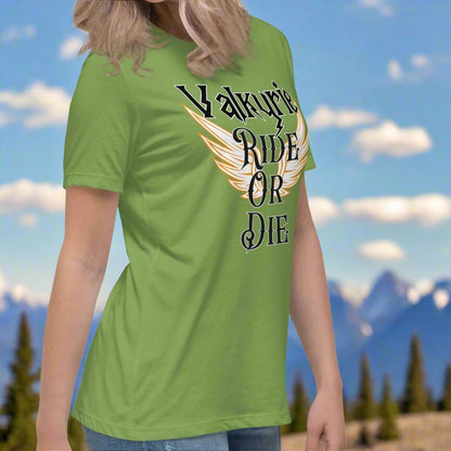 Women's Leaf (green) right side looking back View T-Shirt. White Valkyrie wings edged in gold spread to both sides. Text on shirt Valkyrie Ride or Die.