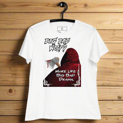 white Mauve Women's Graphic T-Shirt model front view on hanger. Big Bad Wolf Little Red Riding Hood. Big Bad Wolf? More Like Big Bad Drama. Back of Red Riding Hood with hood pulled up, bloodied axe over shoulder.