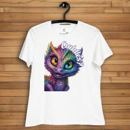 white Dragon Cuddles Front View Women's T-Shirt on a hanger. Whimsical purple iridescent  dragon looking up at the word Cuddles? above his head