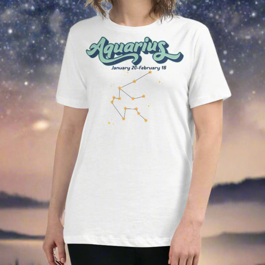 Woman in a white astrology Aquarius T-shirt facing forward. At the top in light blue is the word Aquarius outlined in deeper blue. Below this it says January 20- February 18. Under this is the Aquarius constellation with orange yellow stars connected by a black line. Astrology Zodiac Aquarius Woman's Tee